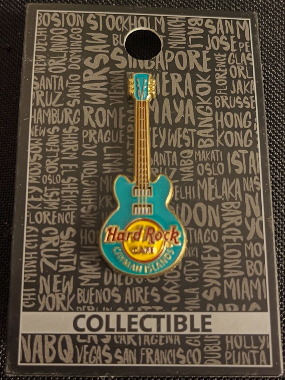 Hard Rock Cafe turquoise and gold guitar pin - Cayman Islands logo